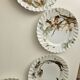 Haviland service, plates, pedestal dishes and soup tureen.