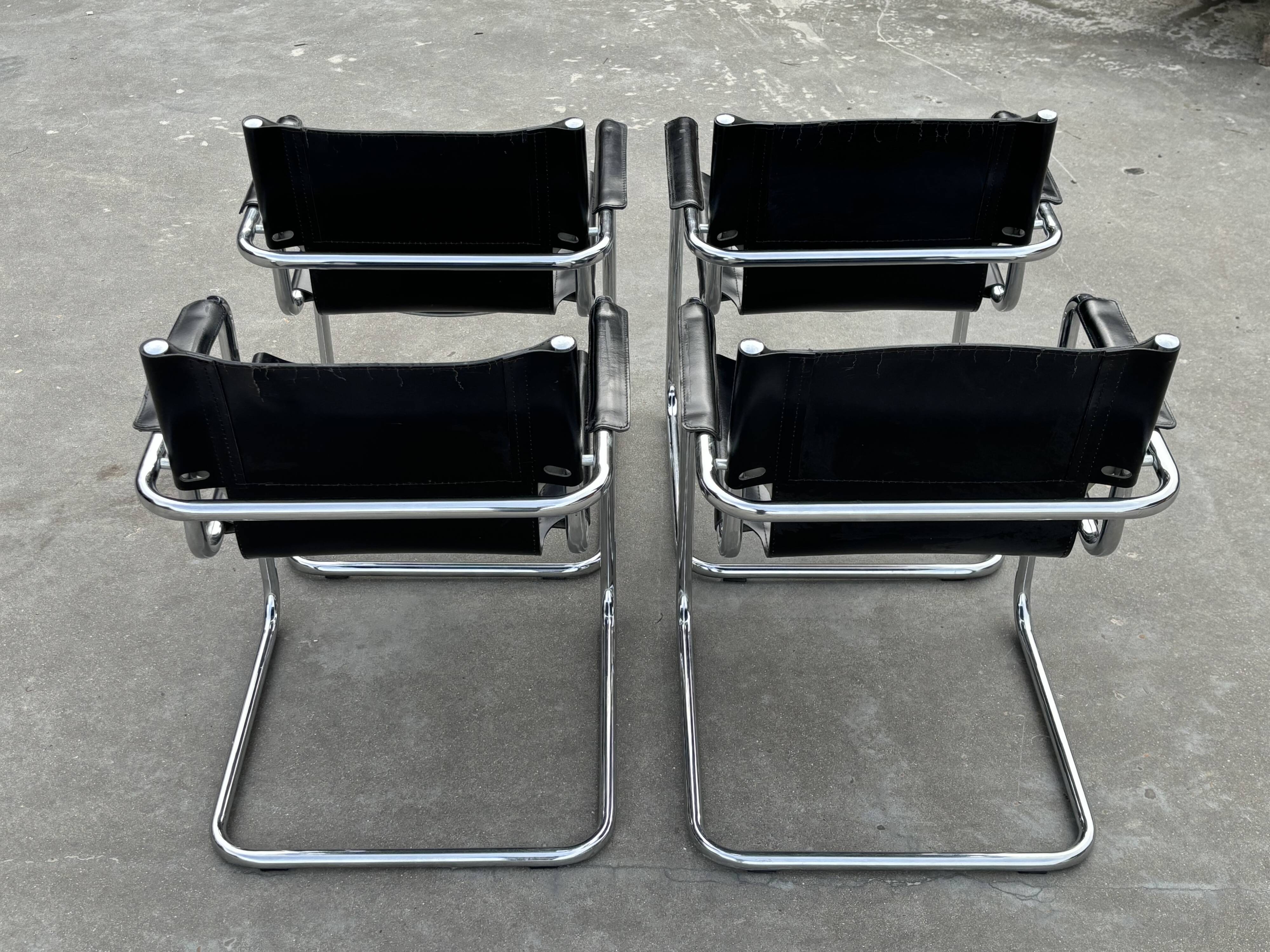 Set of 4 design cantilever chairs black and chrome design made in Italy