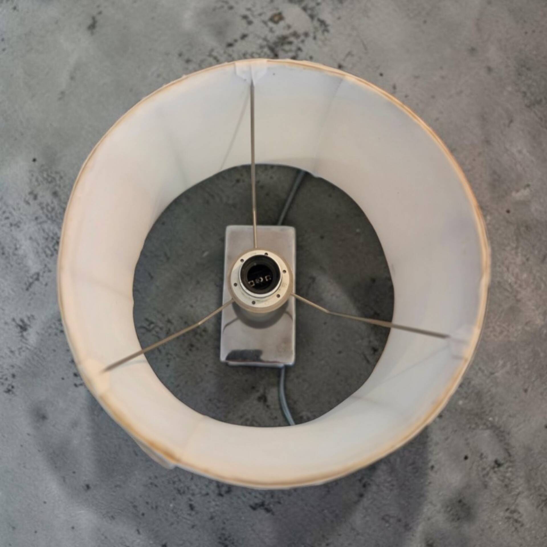 Stainless steel and suede lamp