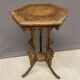 Carved wooden pedestal table