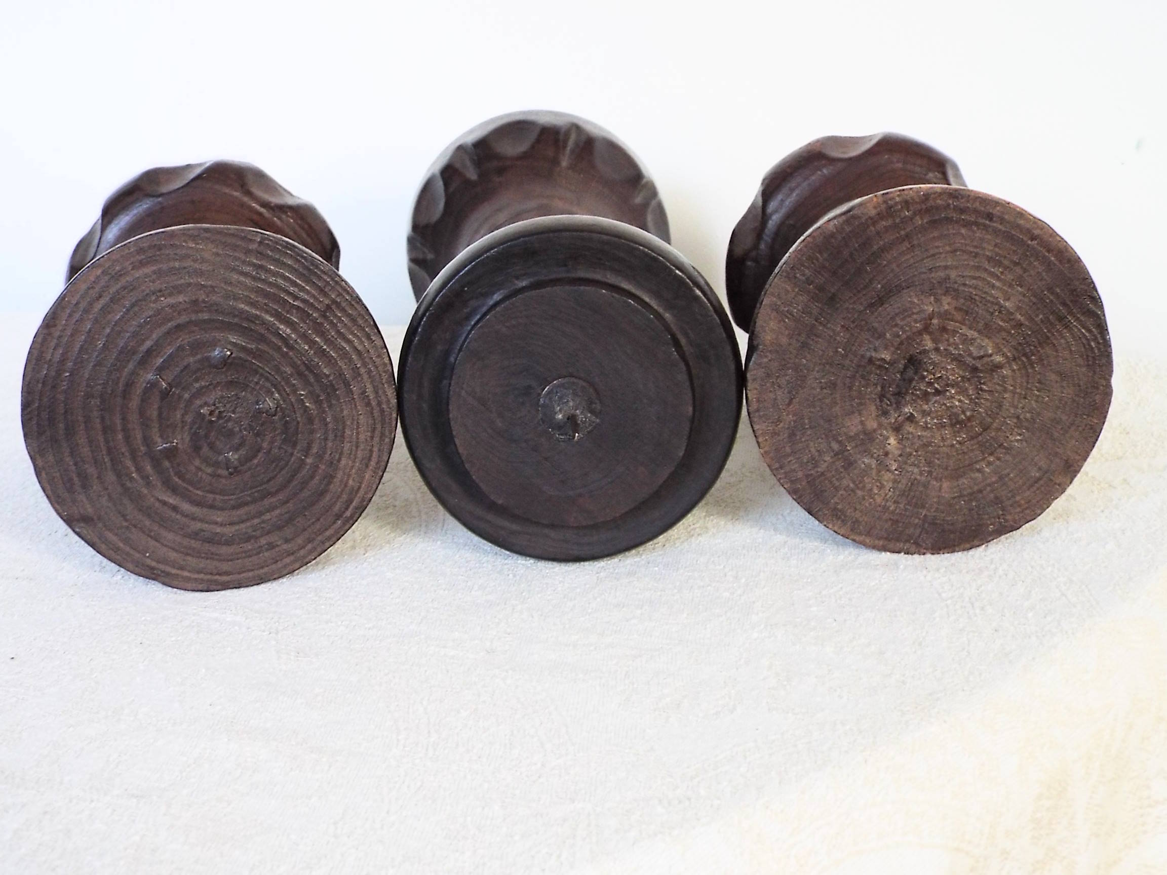 3 turned wooden candle holders