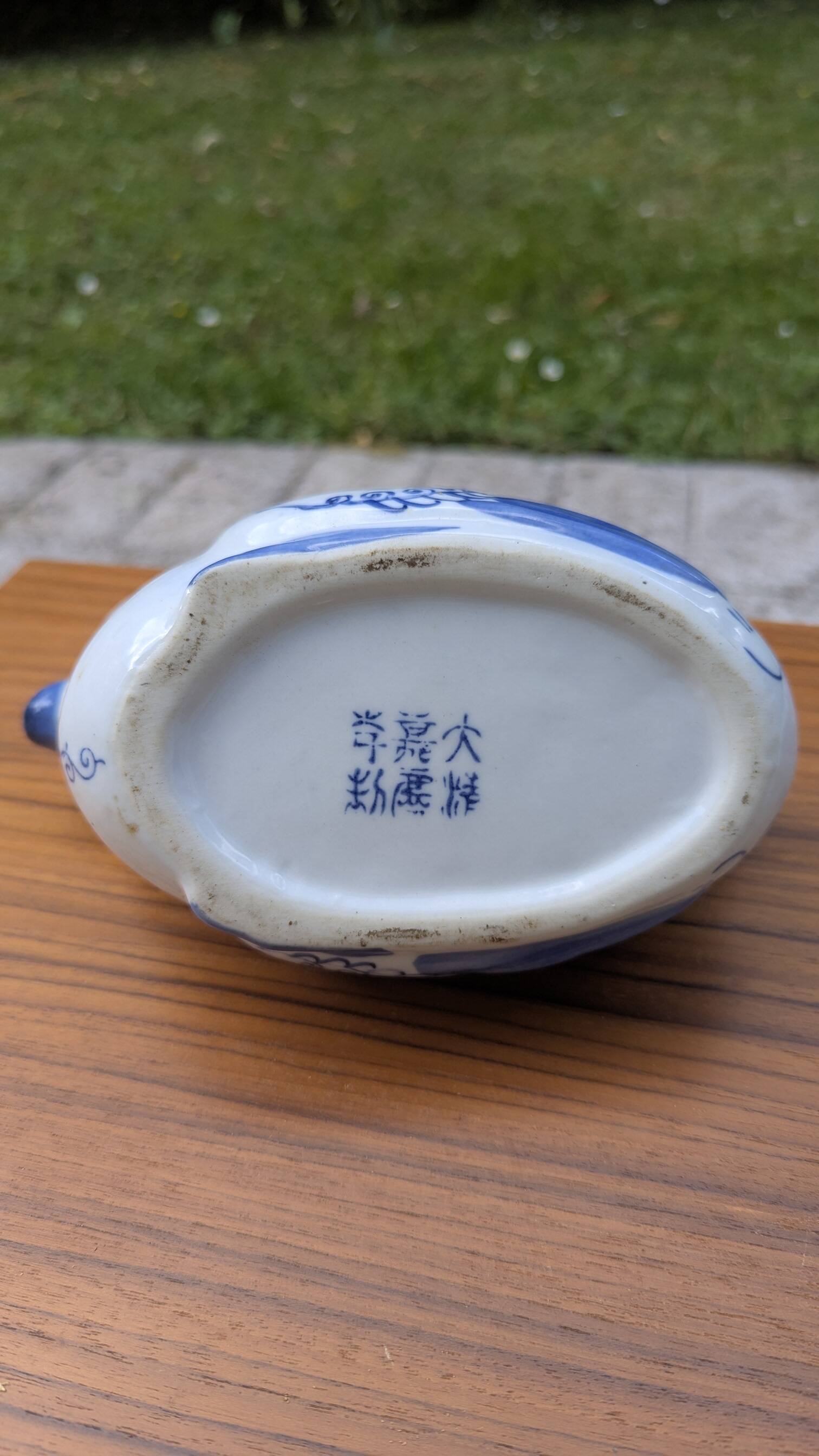 Old teapot / bird-shaped jug in blue and white porcelain