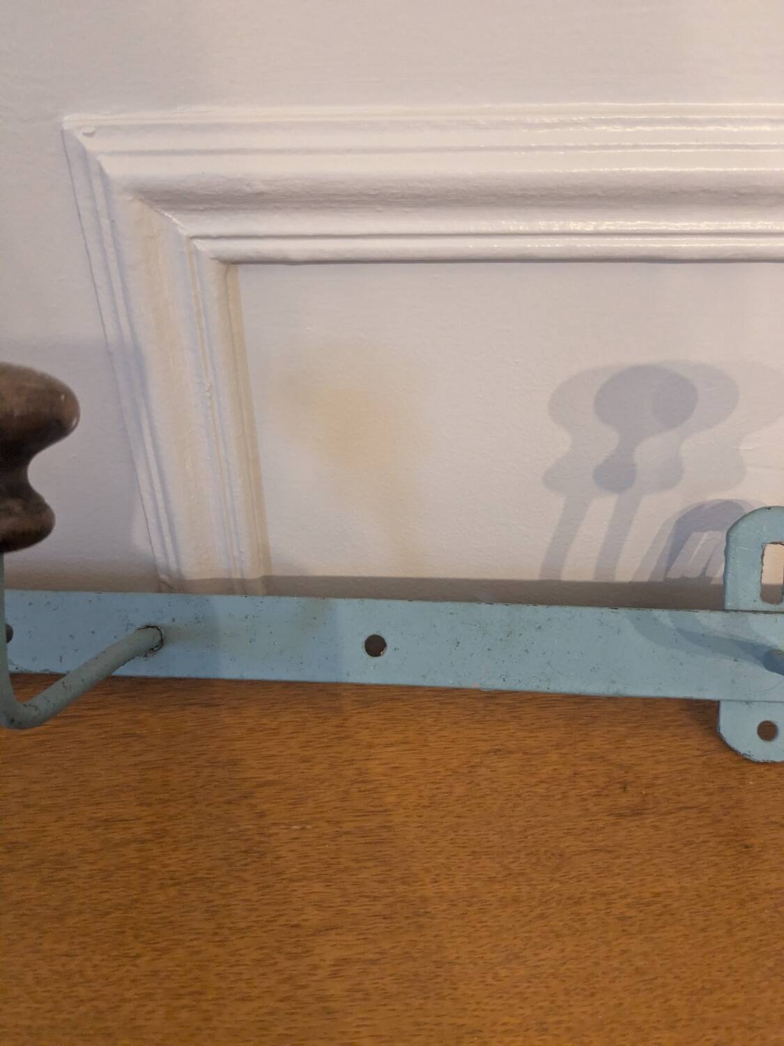 Vintage wall-mounted coat rack