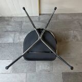 Set of four Italian black leather chairs, 1970