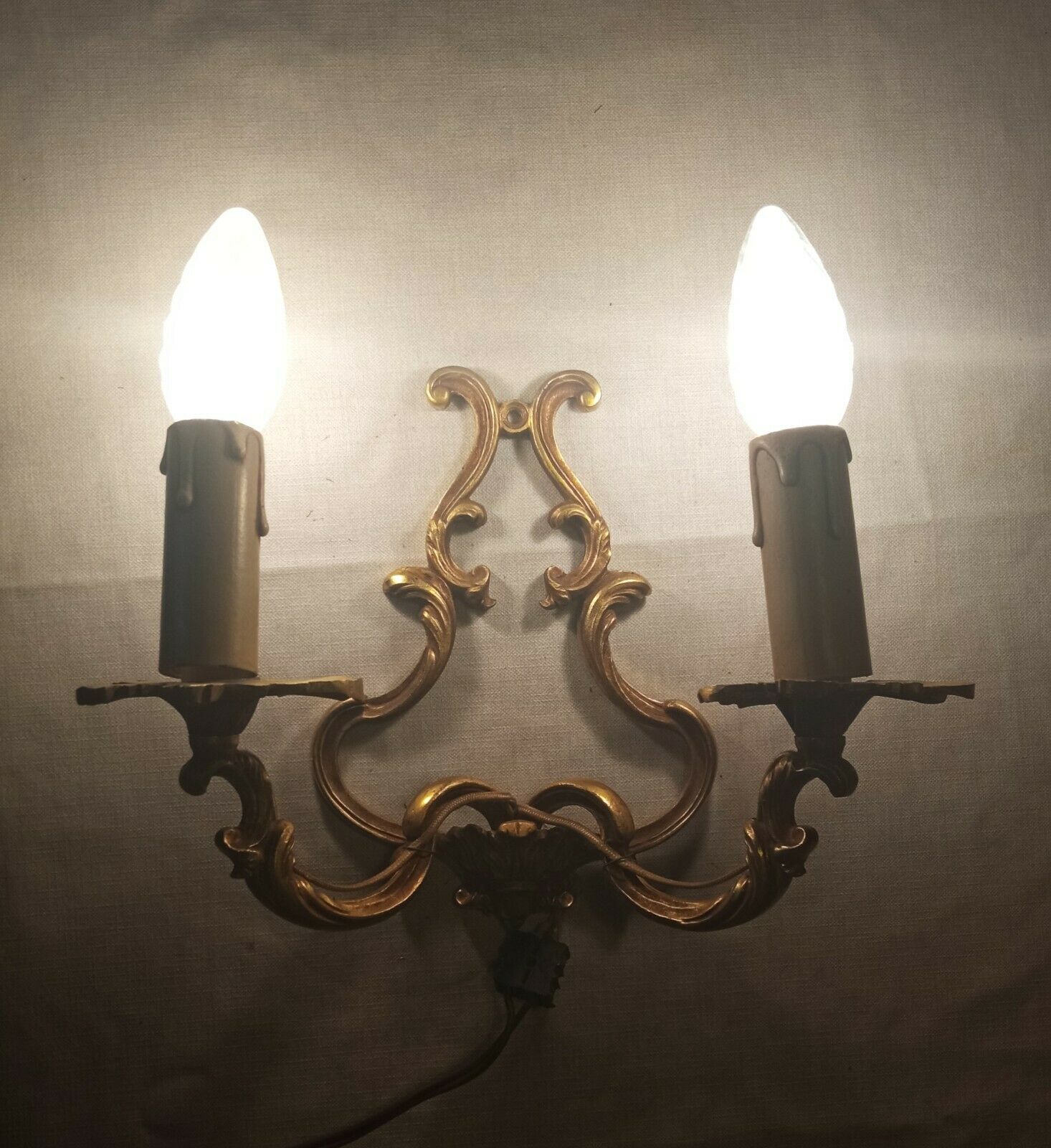 Pair of Louis XV style bronze cage wall lamps