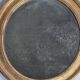 Antique round mirror in gilded wood, original patinated glass from the 19th century, 34 x 37 cm.