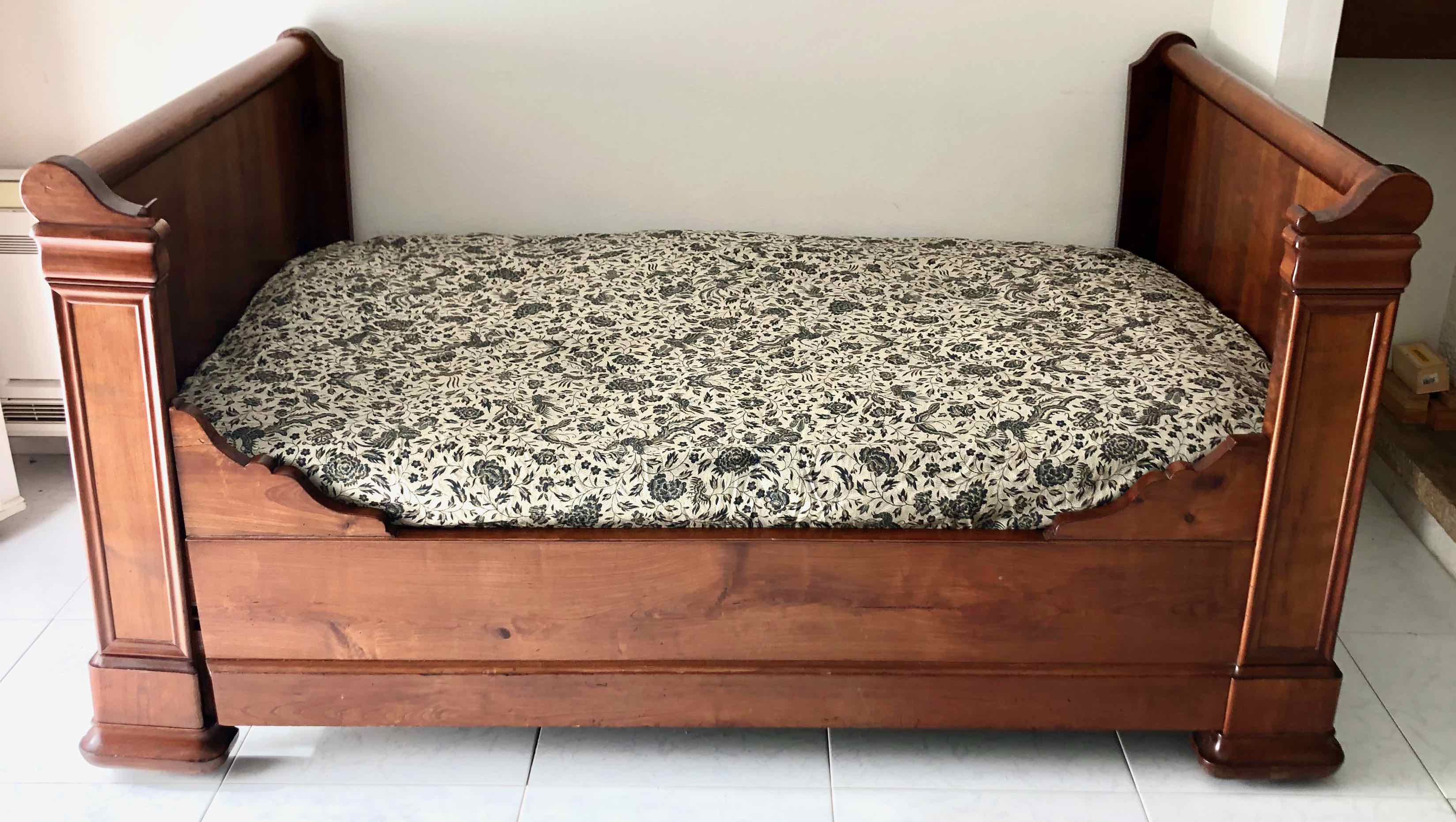 Cherry wood boat bed with bedding