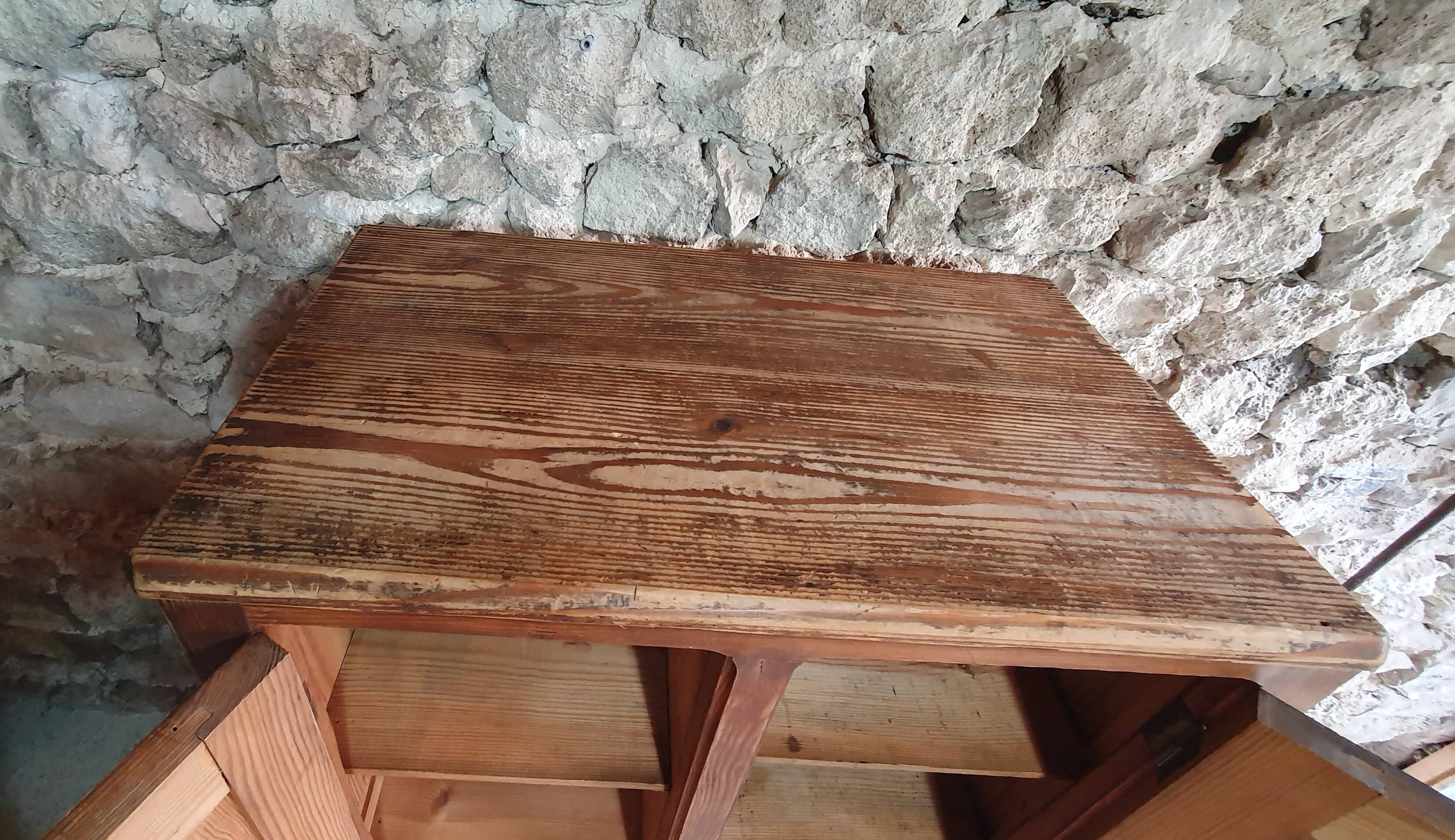 Small cabinet made of raw wood