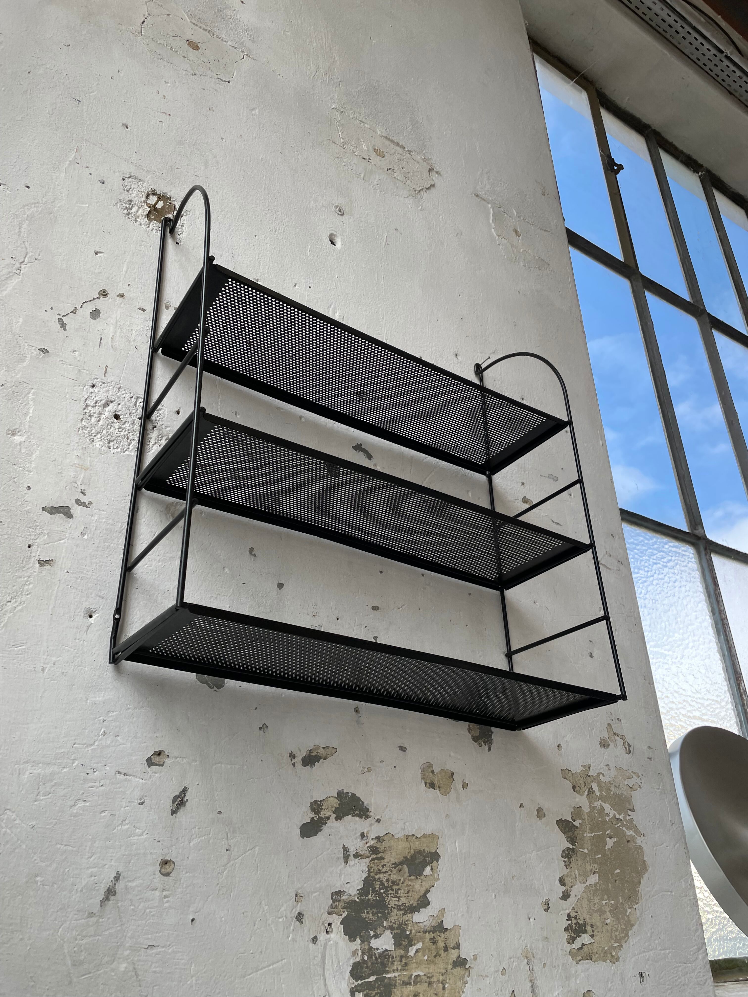 Black metal string shelf