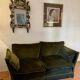 Antique green velvet sofa