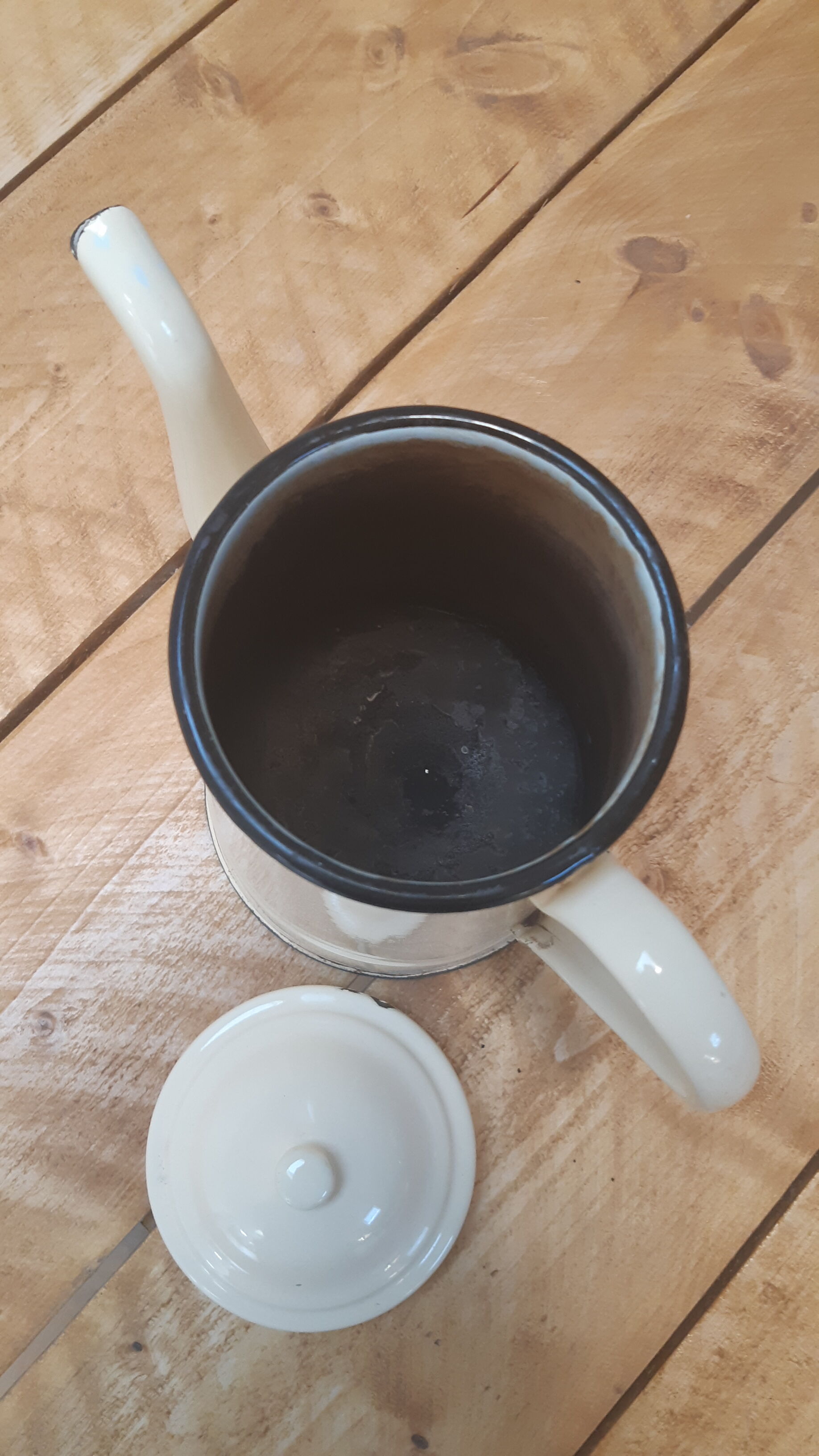 Cream metal teapot