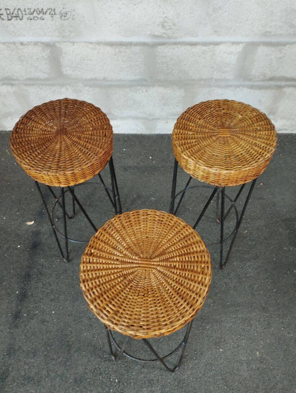 Vintage rattan and metal bar and its stools.
