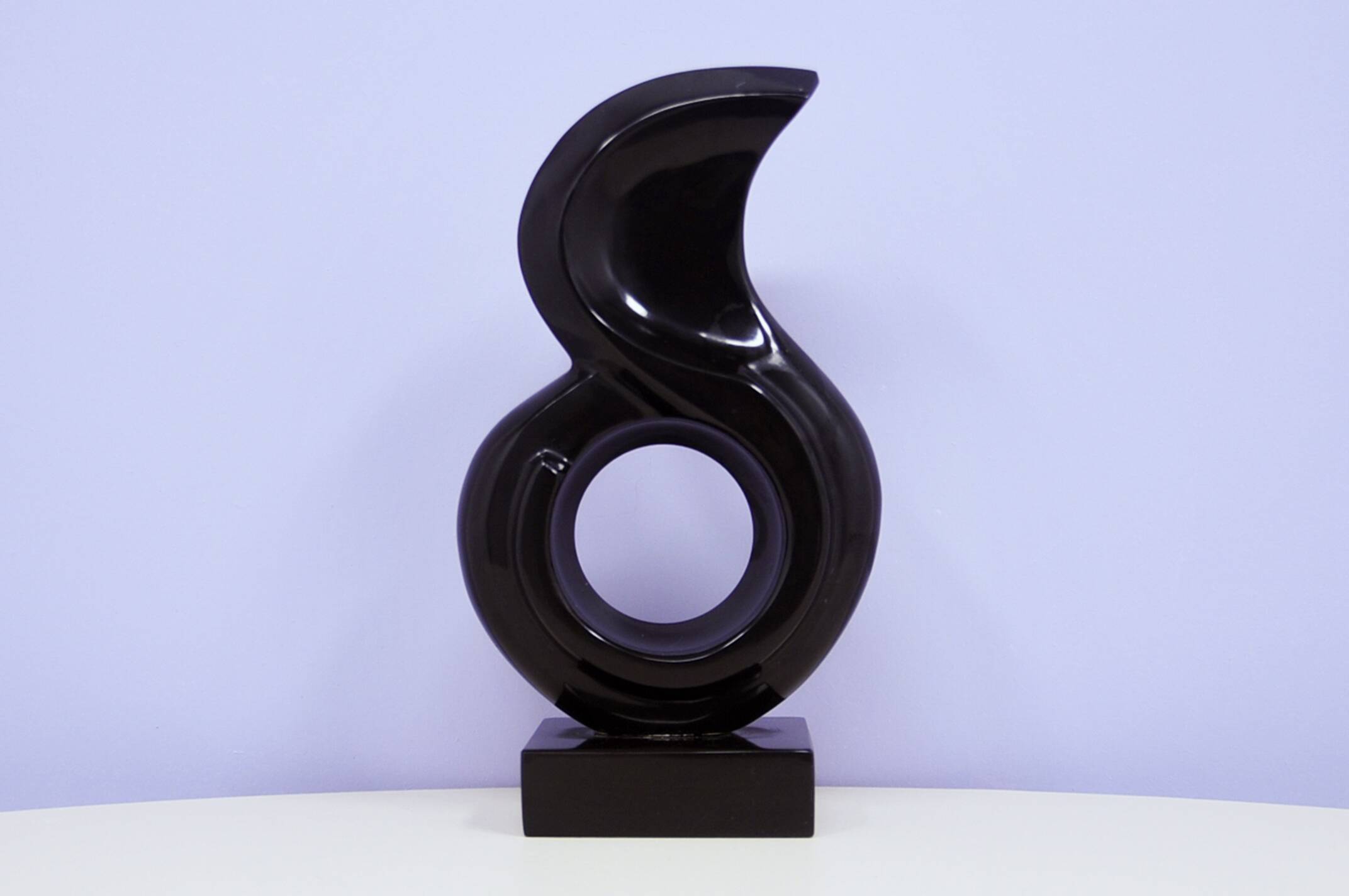 vintage black granite statue by Leonardo Nierman