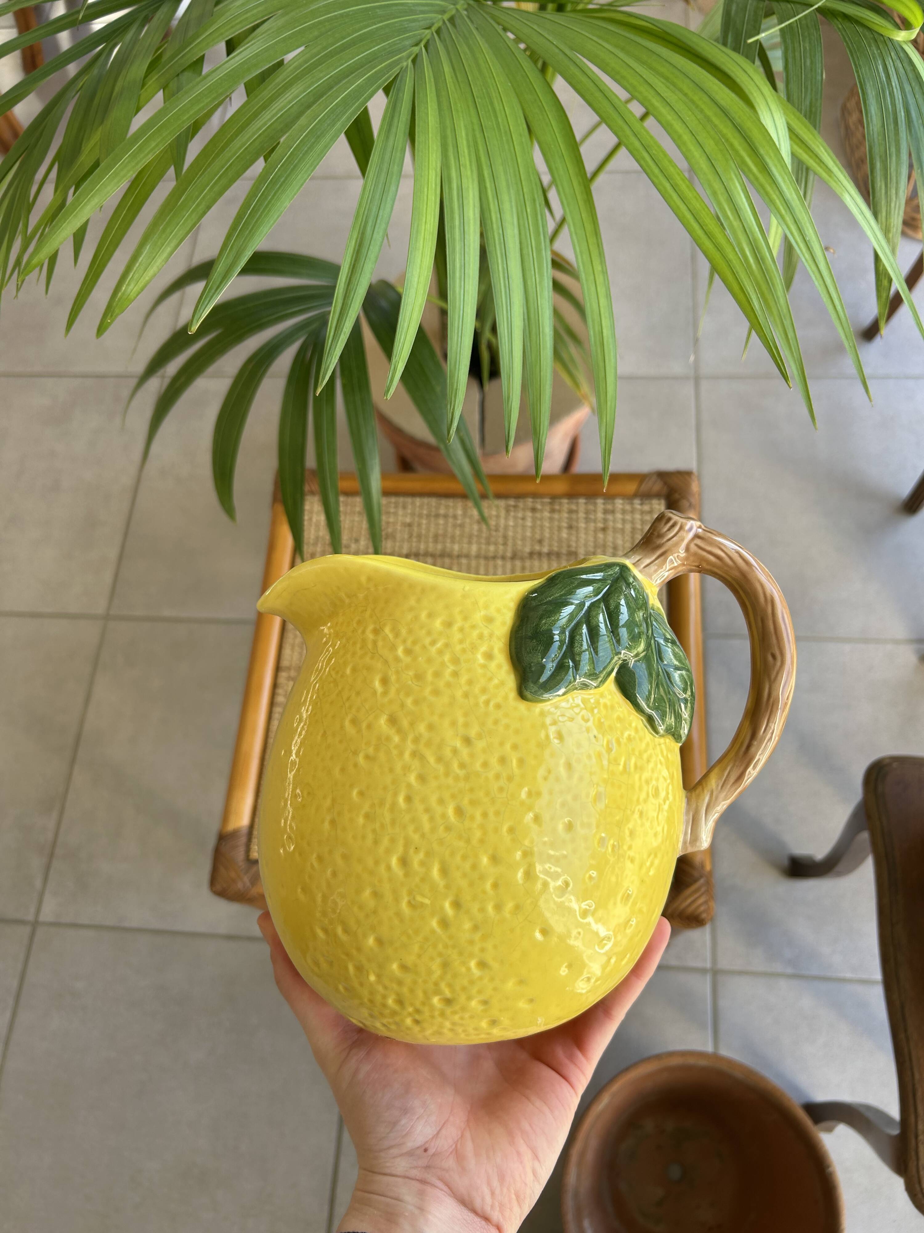 Ceramic jug with a lemon design.