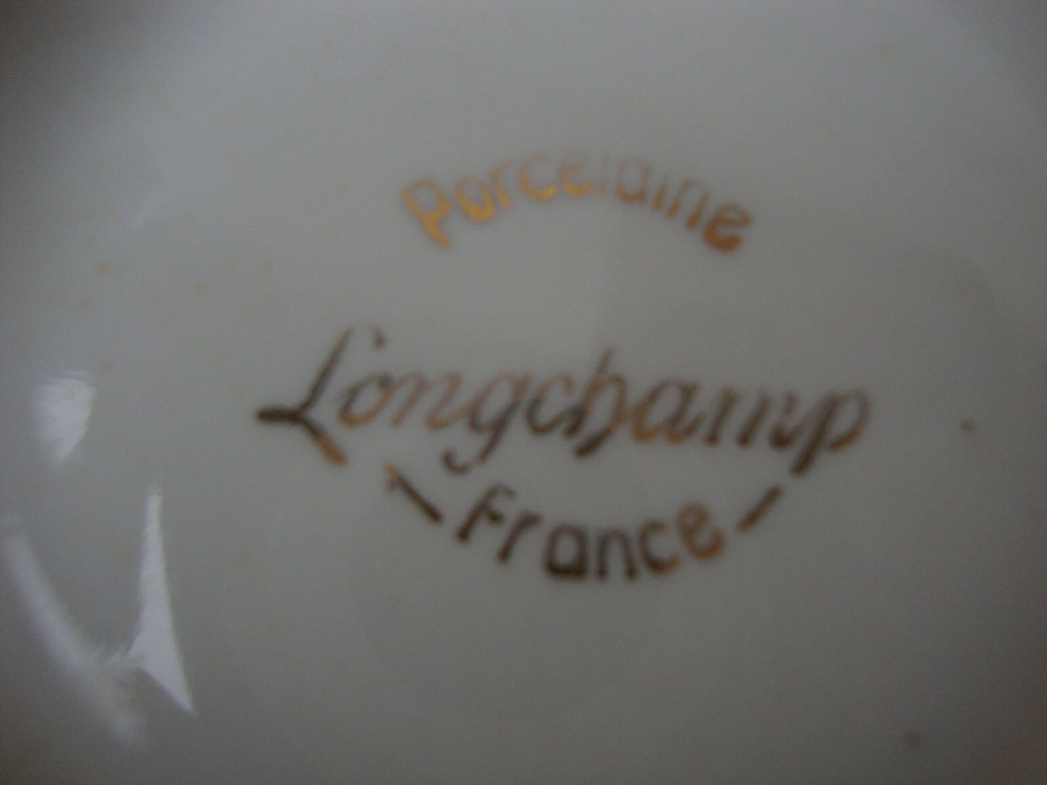 Set of 2 old ribbed white Longchamp porcelain bowls with gold decoration