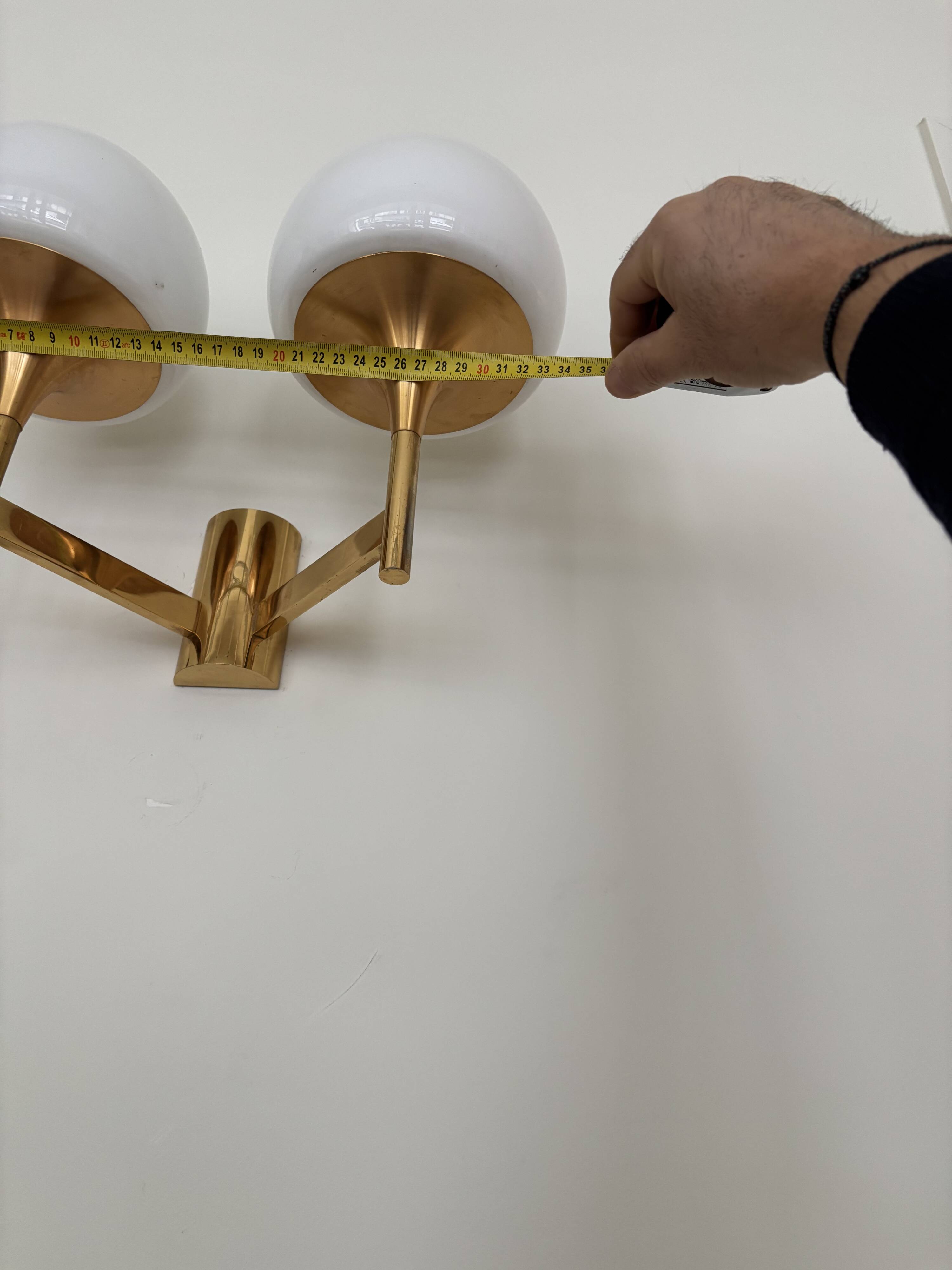 Golden metal wall light and opaline, 1970