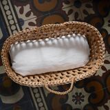 Doll bassinet with its bedding