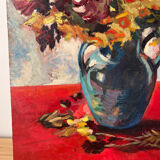 Bouquet of flowers on a red tablecloth, knife on a board, signed Renzo.