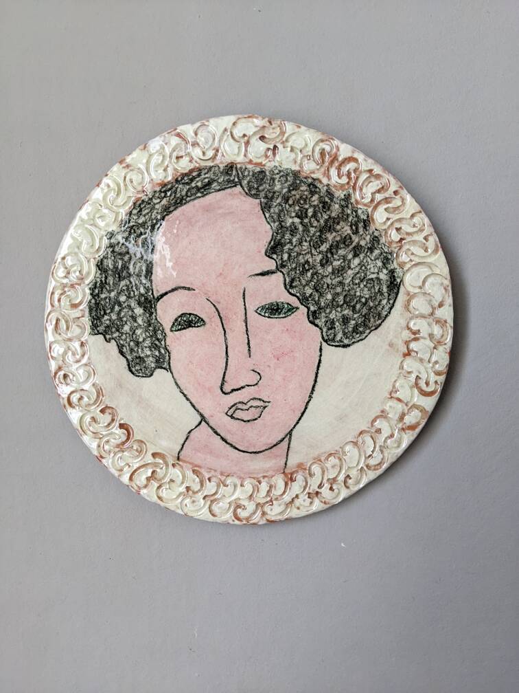 Handmade ceramic wall hanging portrait enameled medallion