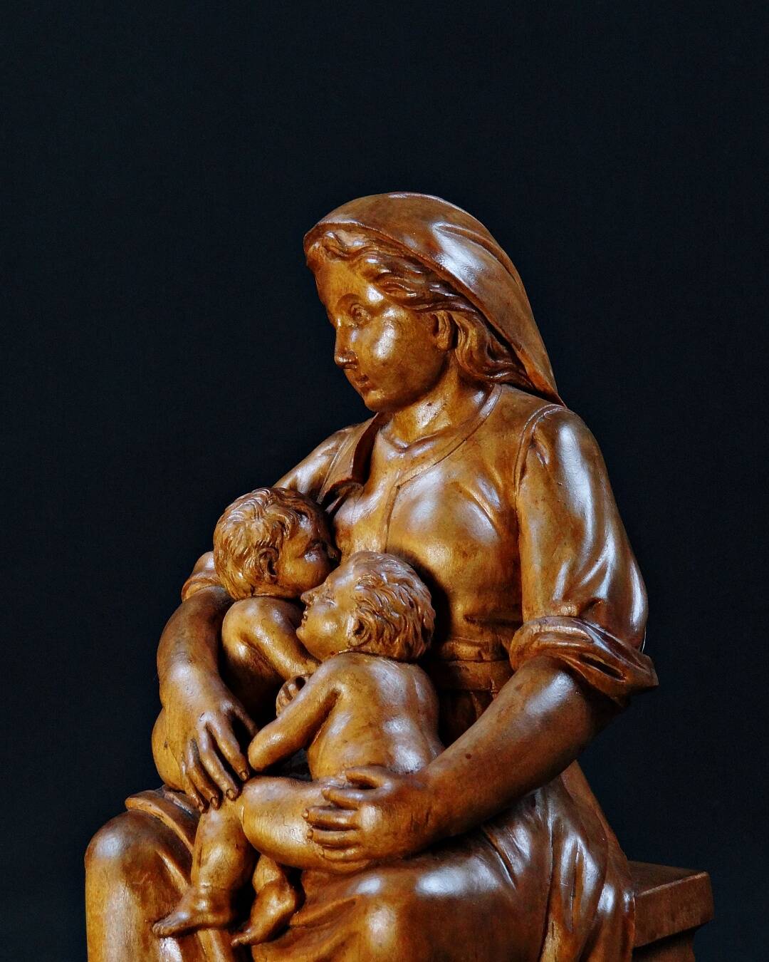 Virgin breastfeeding the Child Jesus and Saint John religious sculpture wood