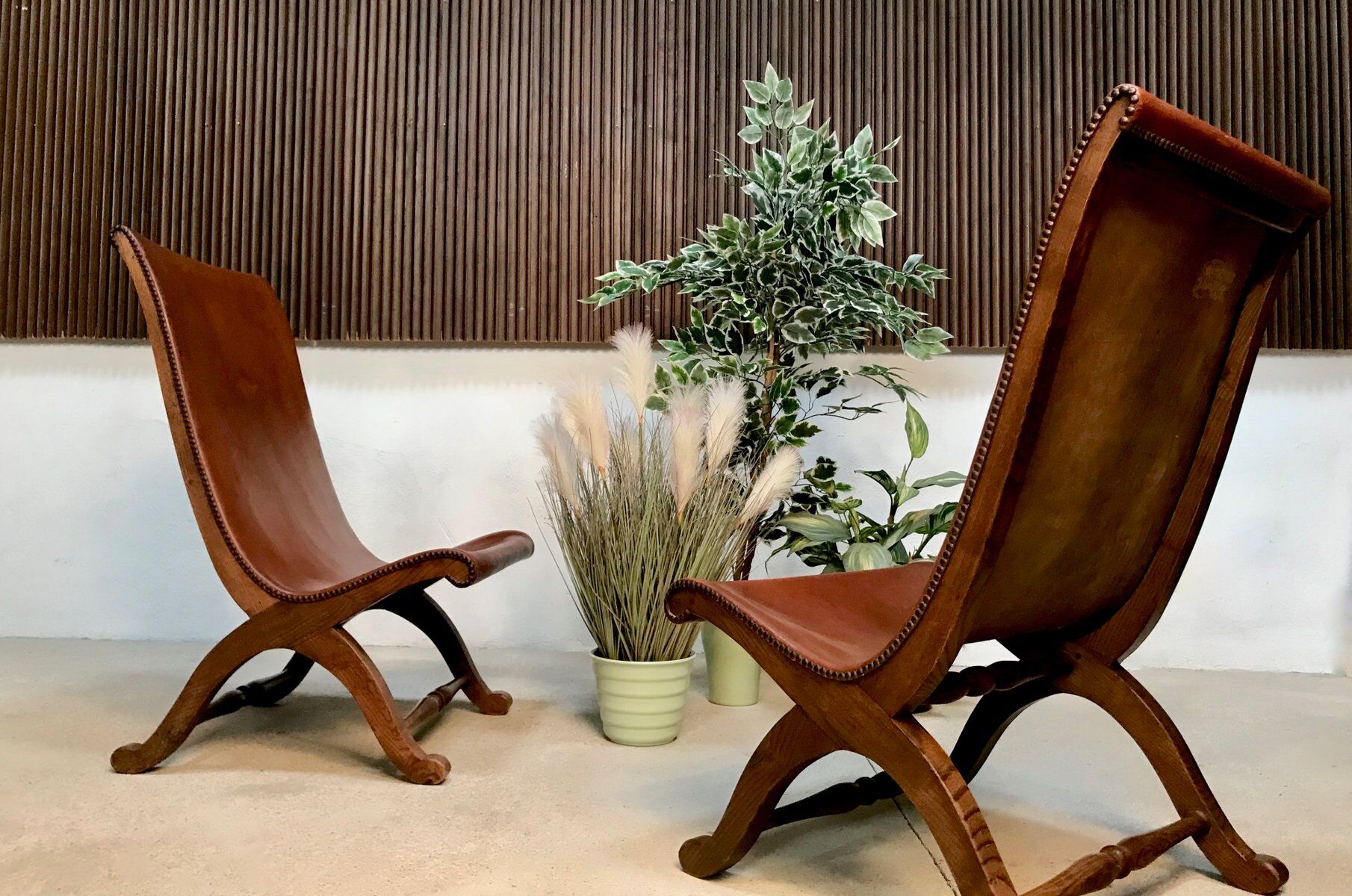 Set of 2 Spanish high-back leather slipper chairs by Pierre Lottier, 1950s