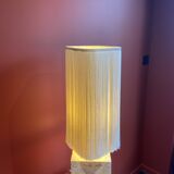 Beige marble stucco base, Houles white ecru fringed lampshade.