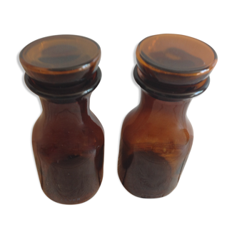 2 amber glass jars