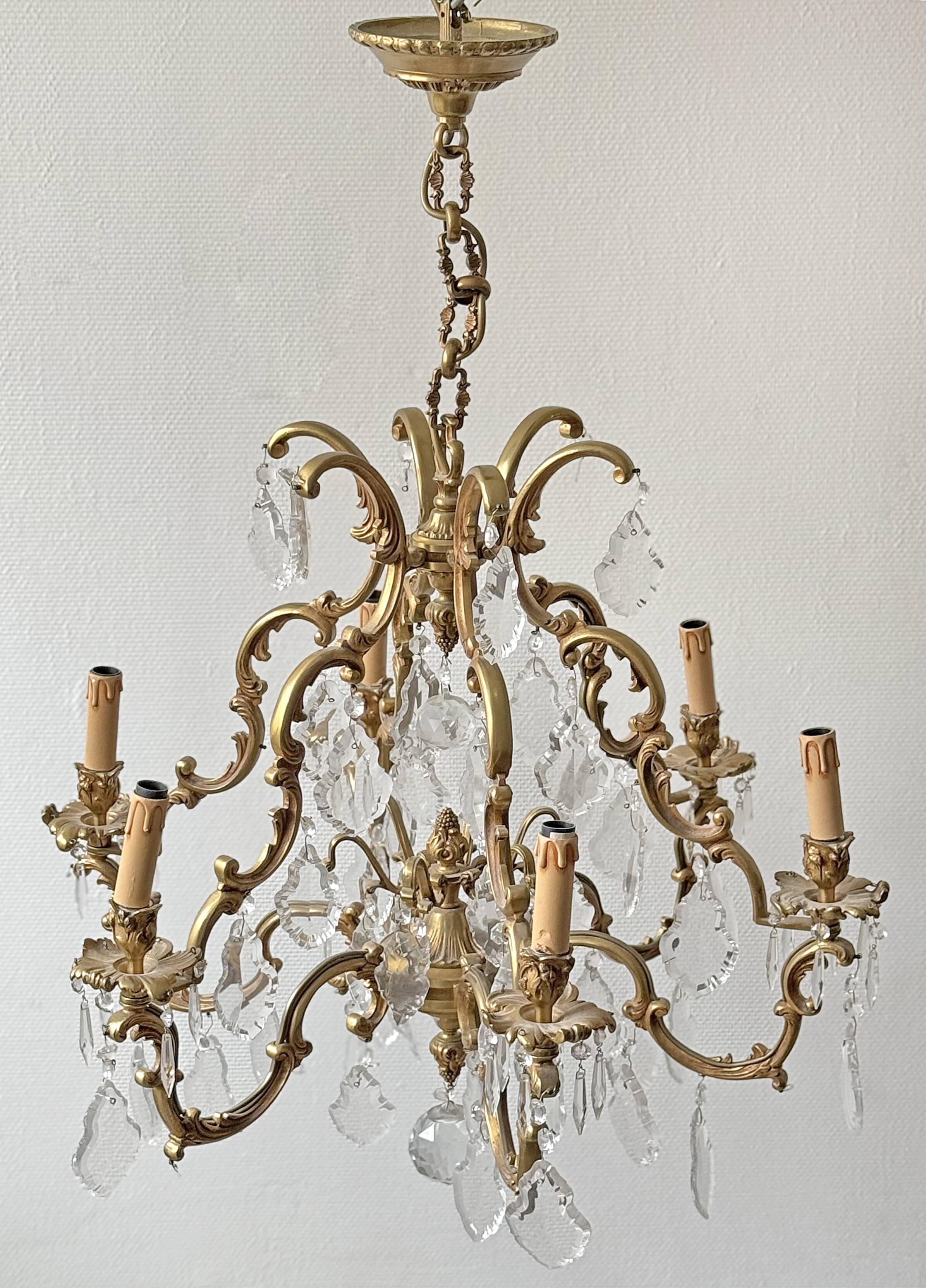 Louis XV style chandelier in gilded bronze with 6 light arms.