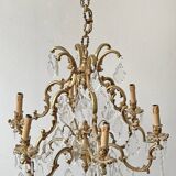 Louis XV style chandelier in gilded bronze with 6 light arms.