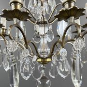 Bronze, brass and crystal chandelier, early 20th century.