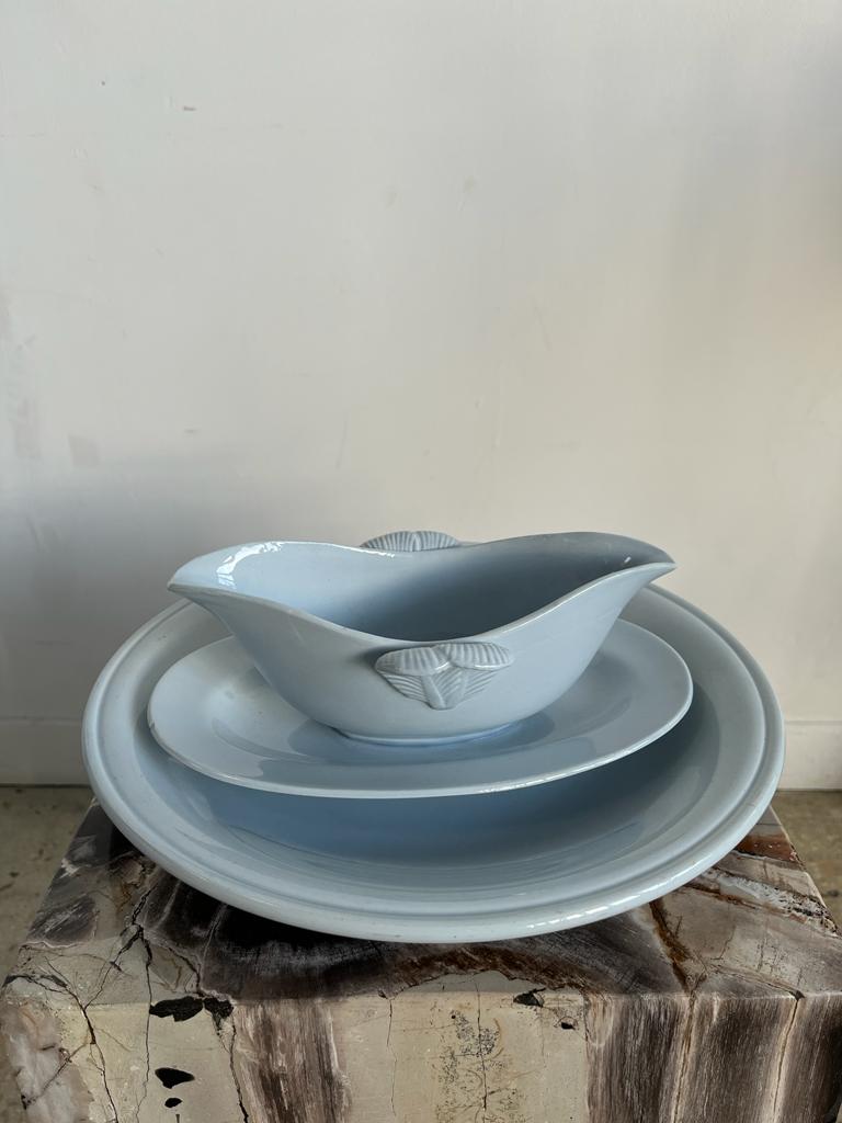 Flat set and light blue saucière earthenware from Montereau