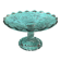 Footed bowl or pressed glass compote with floral decoration for table decor.