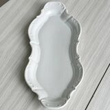 white porcelain plate in an unusual shape