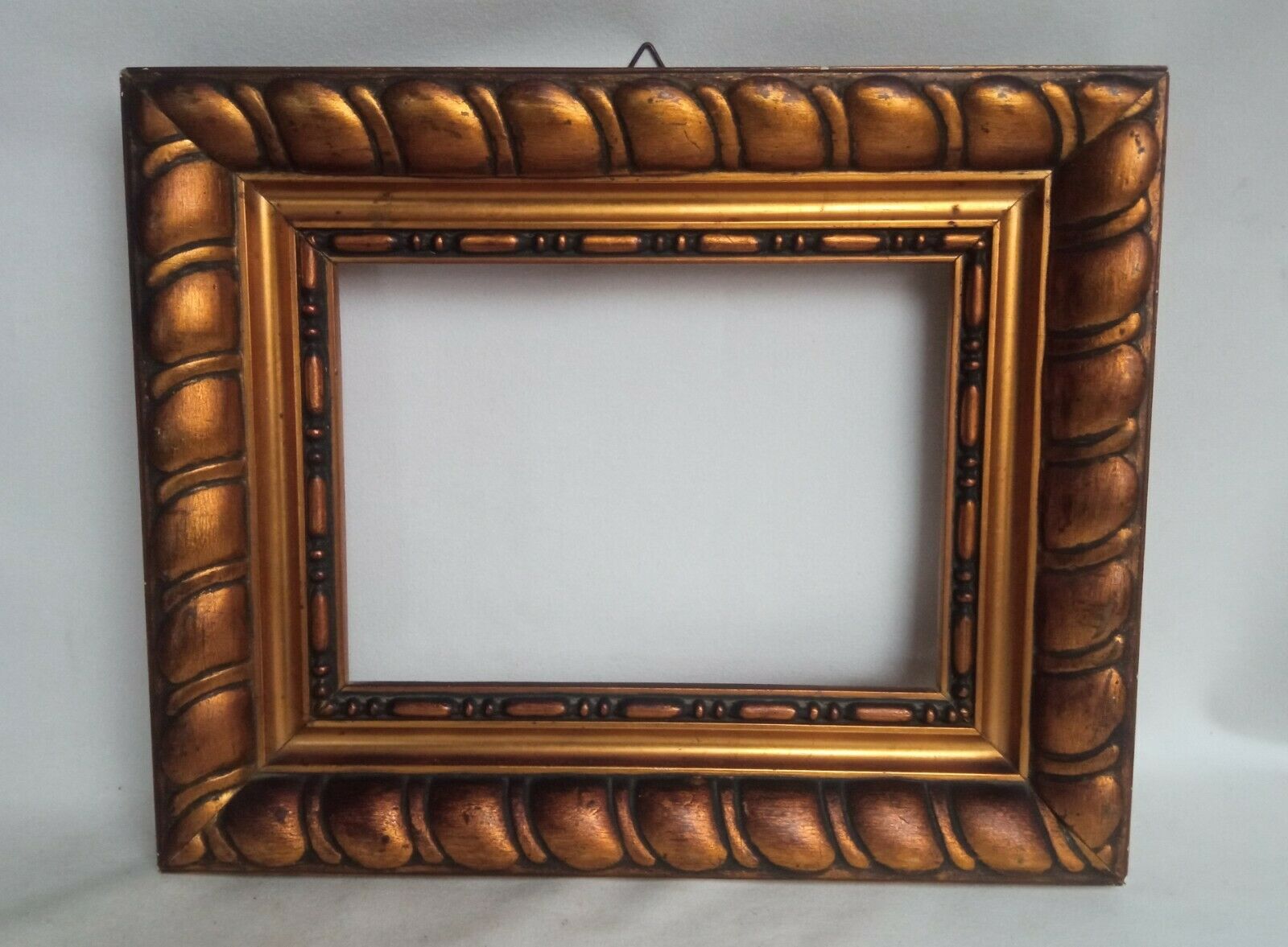 Wooden frame and gilded stucco circa 1900