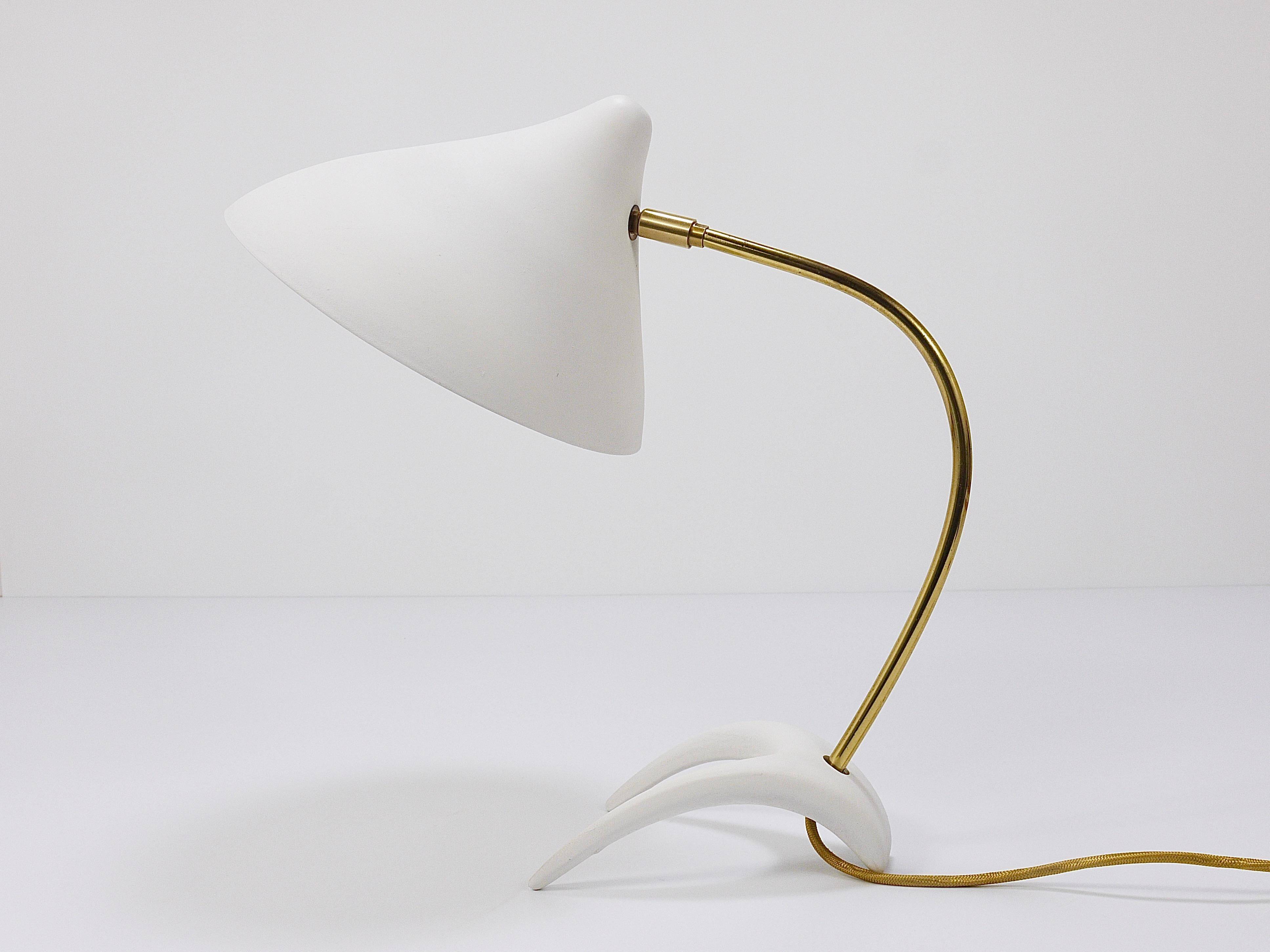 White brass desk or table lamp in the Louis Kalff style from the 1950s.