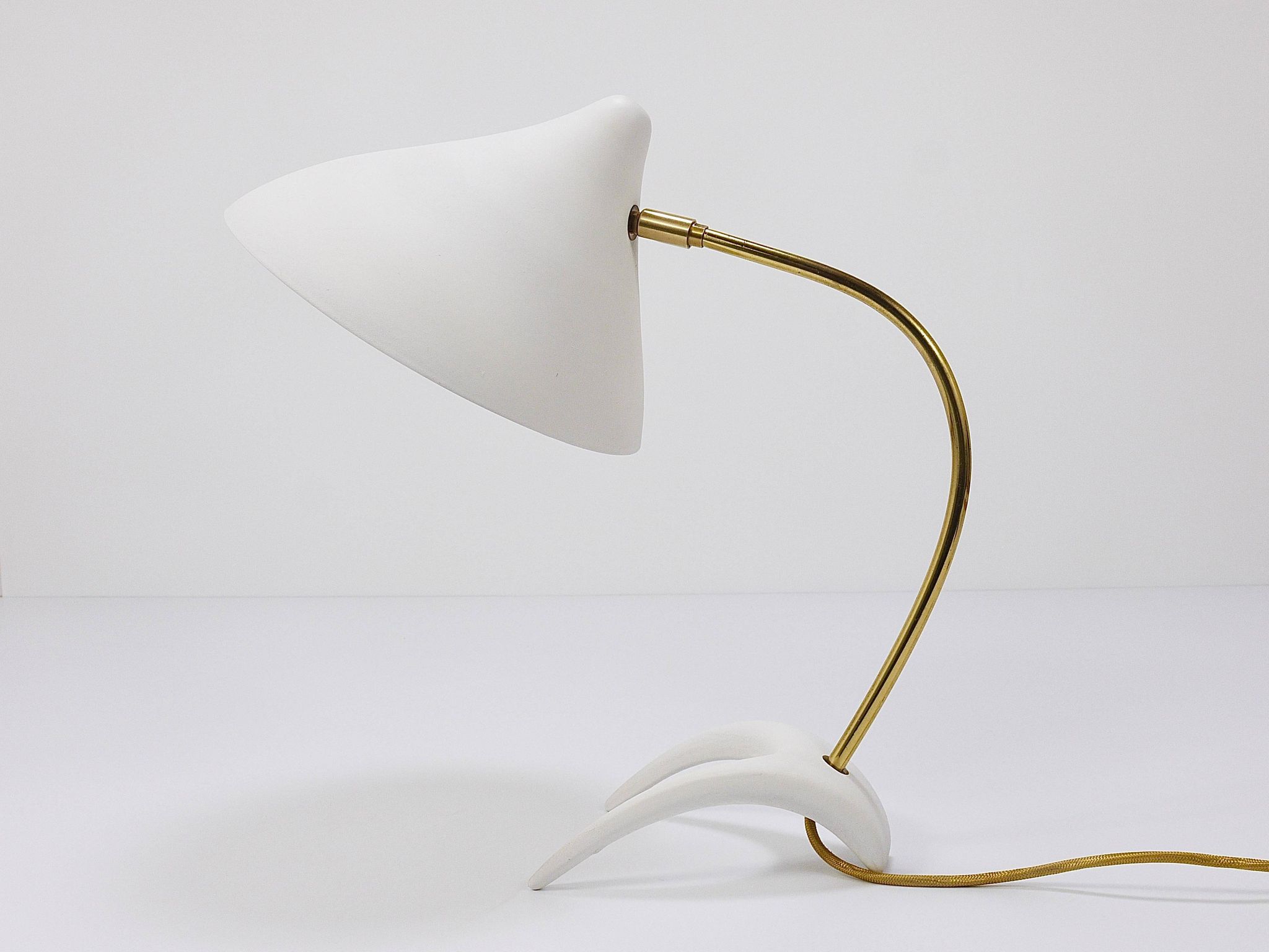 White brass desk or table lamp in the Louis Kalff style from the 1950s.