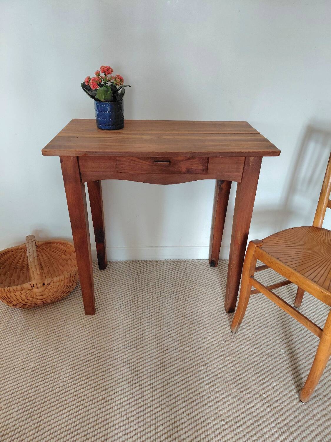 Small antique solid wood table in chic country style with a drawer.