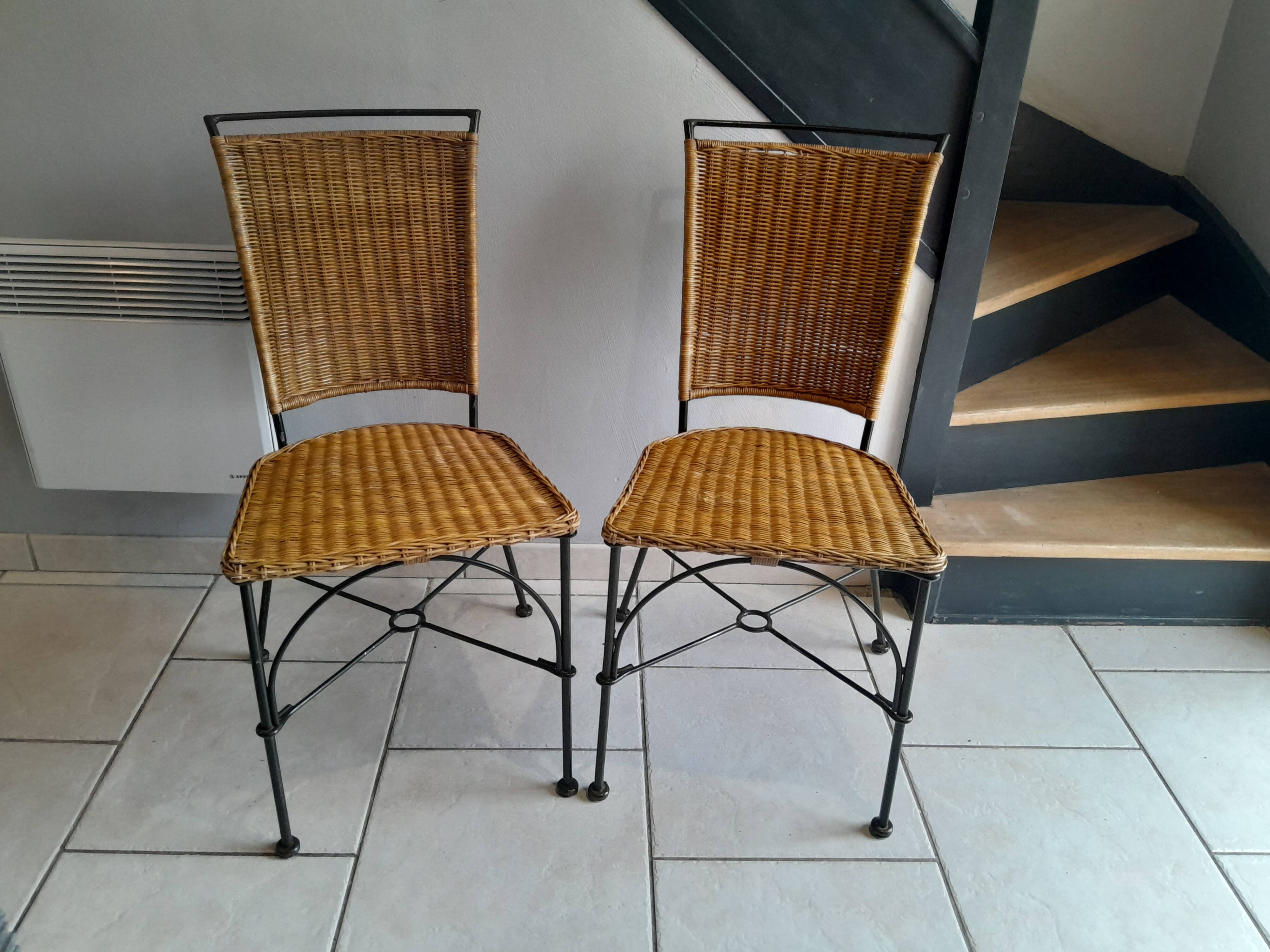 Pair of vintage wrought iron and rattan chairs