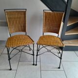 Pair of vintage wrought iron and rattan chairs