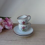 Set of two flowered stoneware cups with saucer from the 1980s.