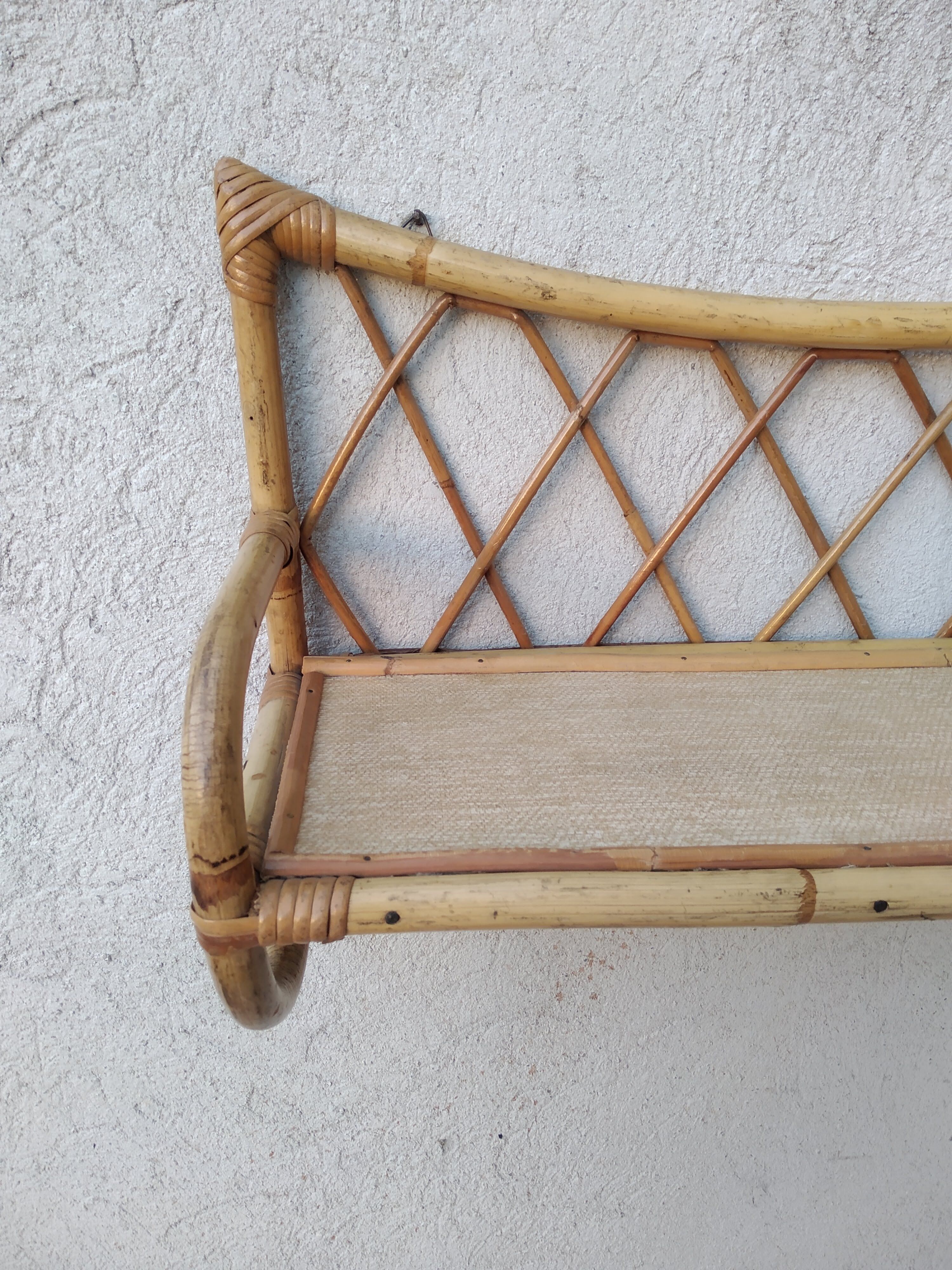 Rattan wall shelf from the 60s