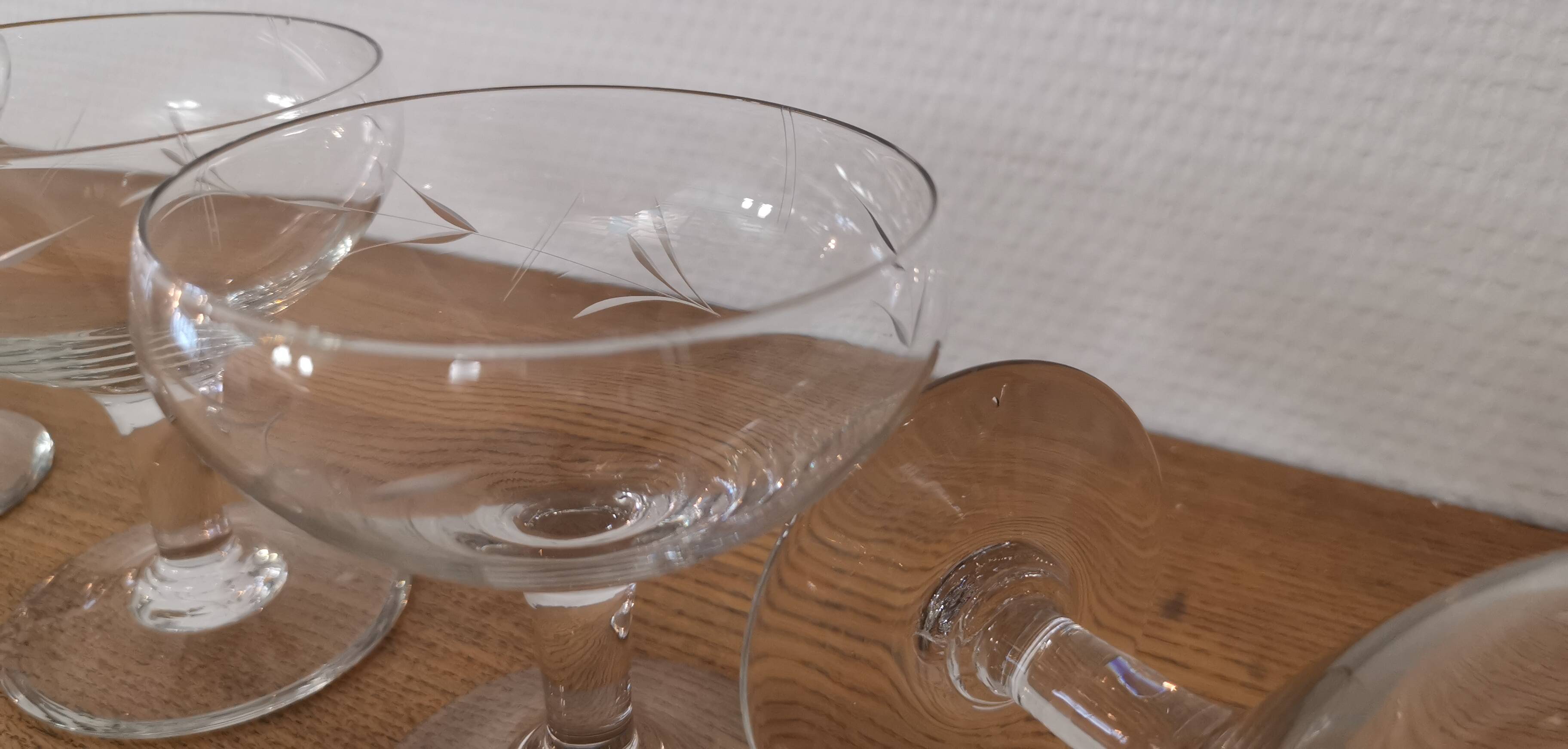 Set of 7 vintage engraved champagne glasses