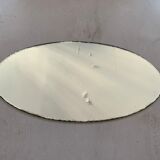 Old beveled oval mirror