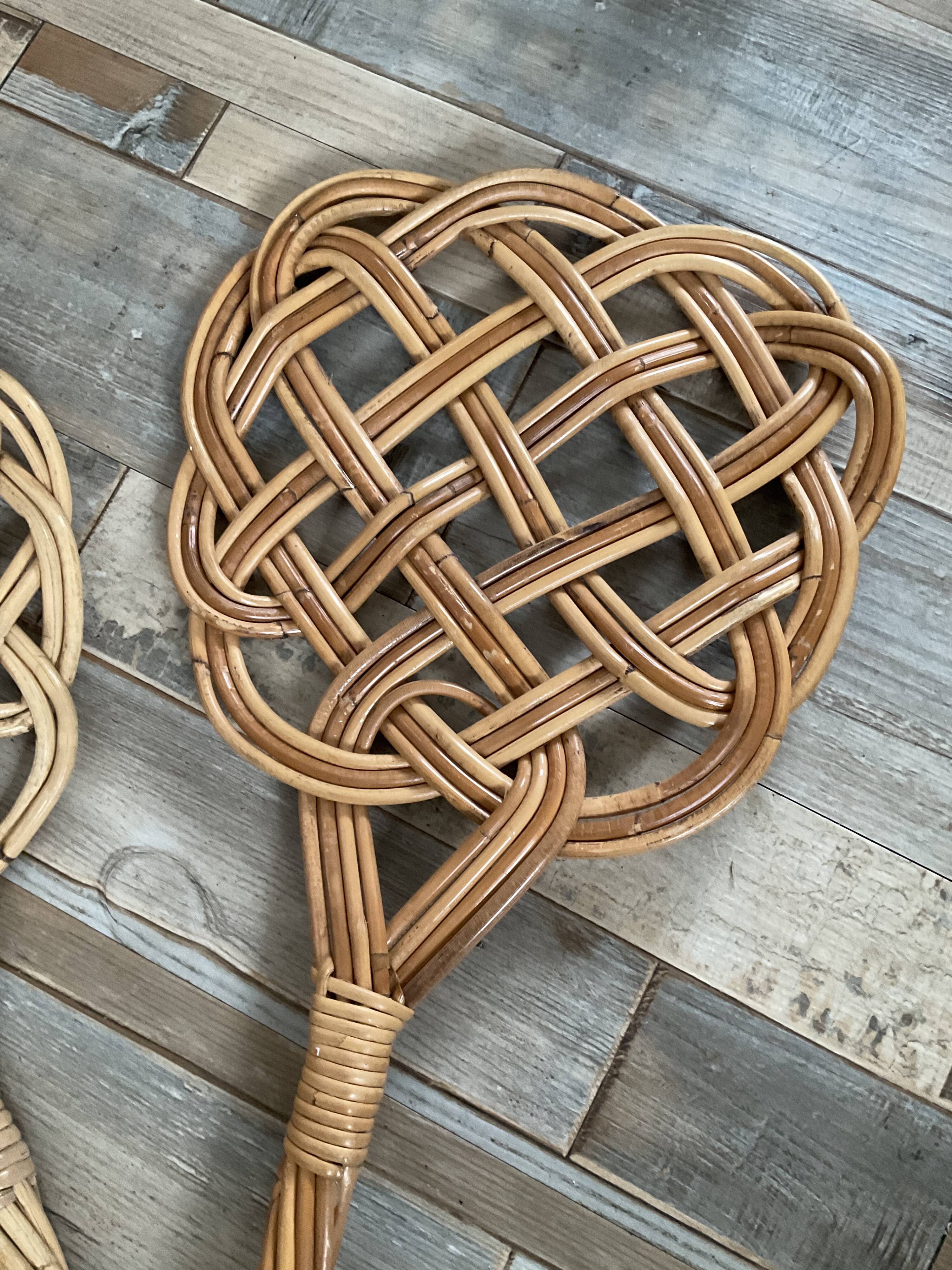 Duo of vintage rattan carpet beaters from the 70s