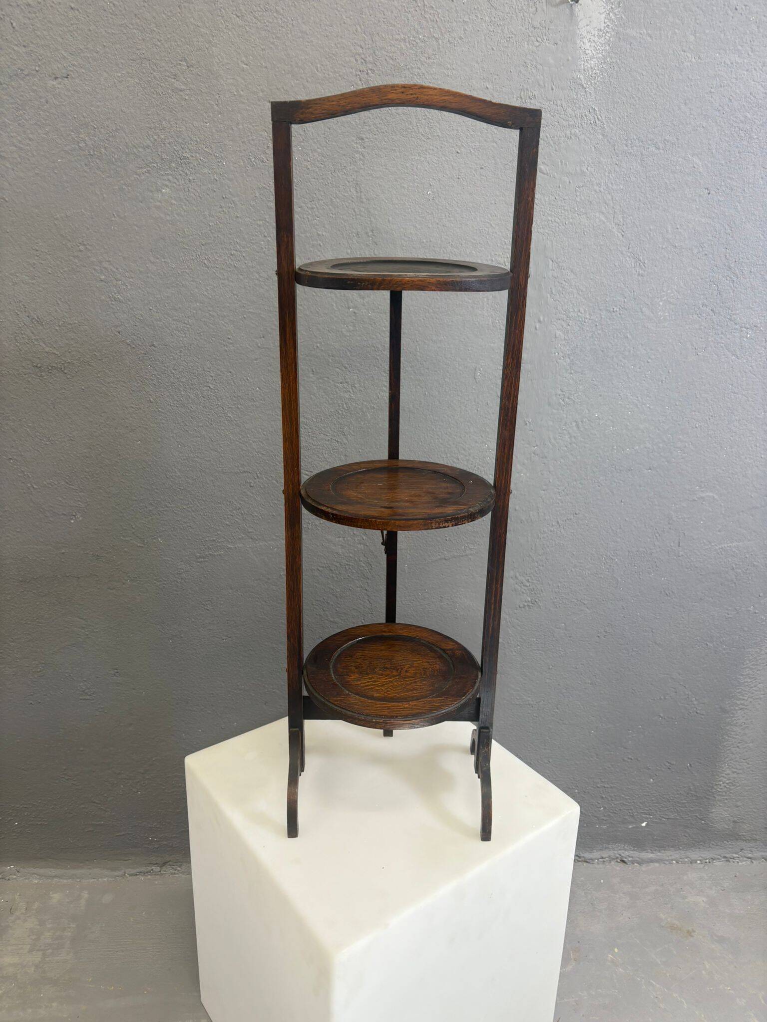 Vintage 3-tier cake stand in dark wood, 1920s serving display.