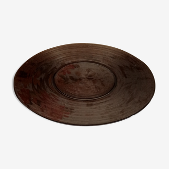 Flared round dish in striated brown glass