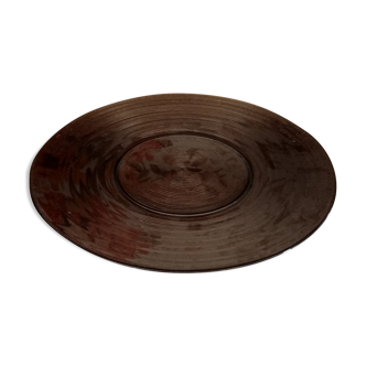 Flared round dish in striated brown glass