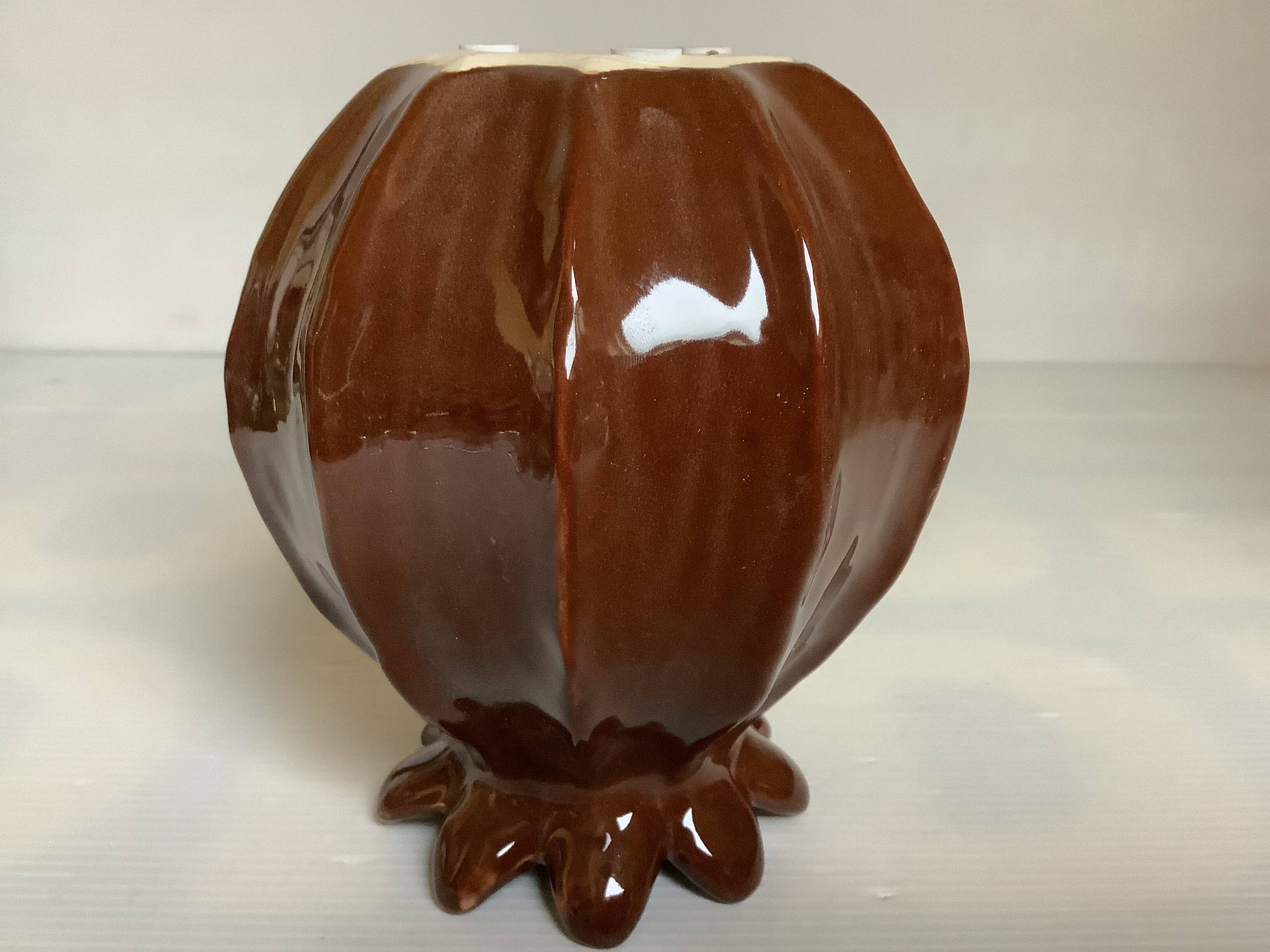 Brown ceramic corolla vase