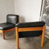Pair of designer leather armchairs 80s