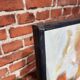 Peinture signée Al Richard portrait d'une femme portant un chat
